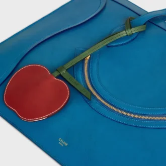 Apple-nyckelring i slätt lammskinn
