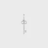 Berlock Triomphe Key i mässing med rodiumfinish Berlock Triomphe Key i mässing med rodiumfinish