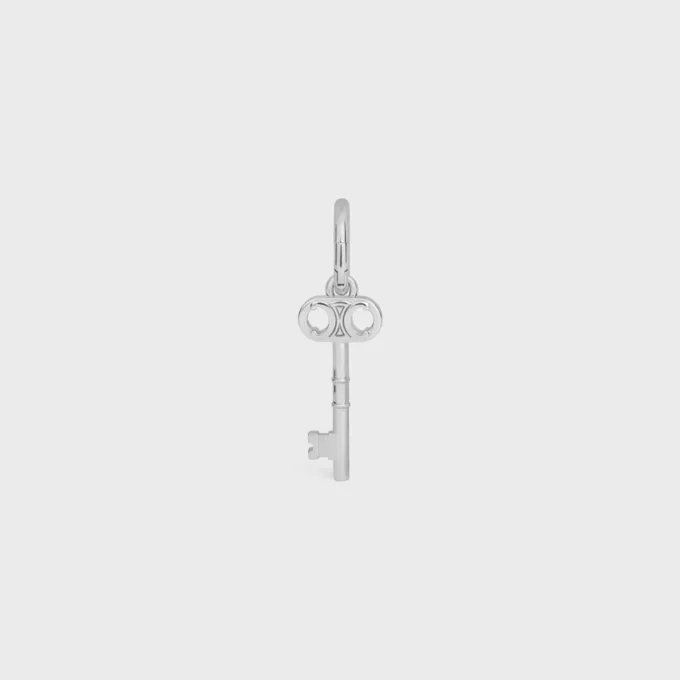 Berlock Triomphe Key i mässing med rodiumfinish Berlock Triomphe Key i mässing med rodiumfinish