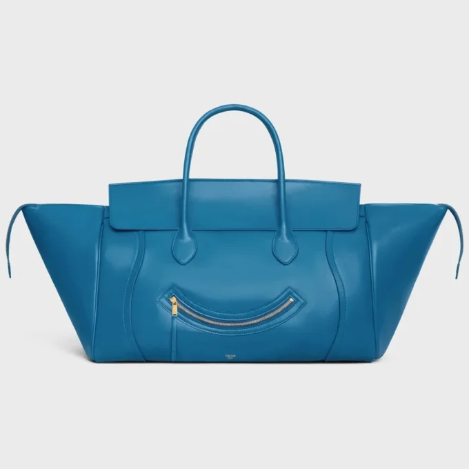 Big Smile-luggage i glansigt kalvskinn
