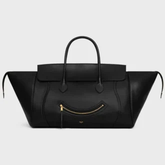Big Smile Luggage i mjukt, glansigt lammskinn
