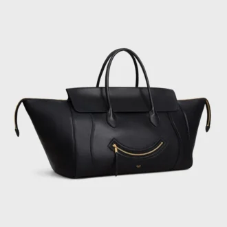 Big Smile Luggage i mjukt, glansigt lammskinn