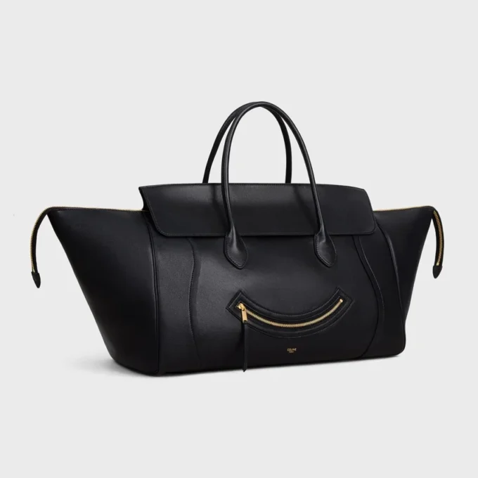 Big Smile Luggage i mjukt, glansigt lammskinn