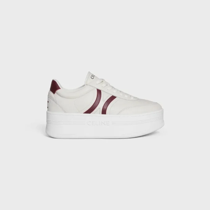 CELINE – Block-sneakers med Triomphe-mönster baktill och kilklack i kalvskinn CELINE – Block-sneakers med Triomphe-mönster baktill och kilklack i kalvskinn