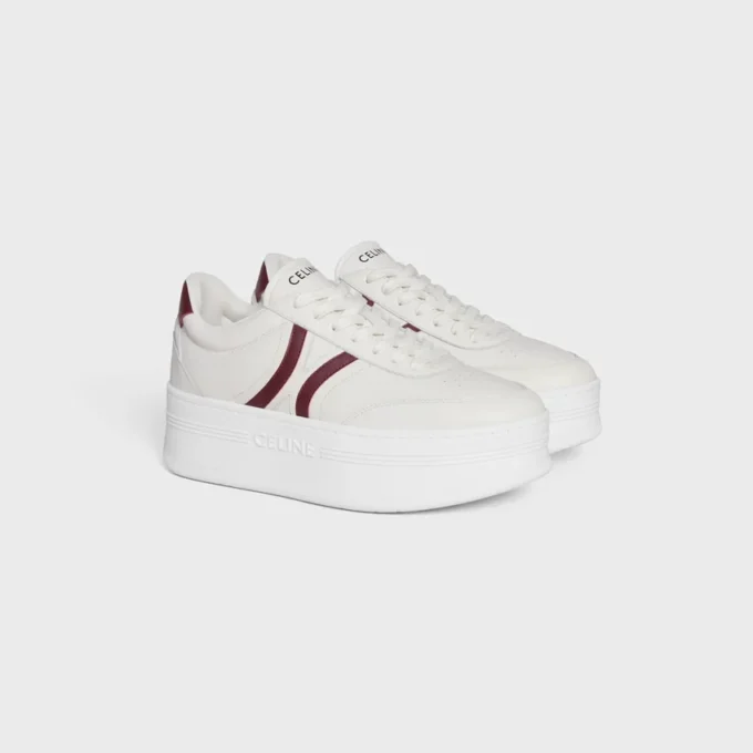 CELINE – Block-sneakers med Triomphe-mönster baktill och kilklack i kalvskinn CELINE – Block-sneakers med Triomphe-mönster baktill och kilklack i kalvskinn