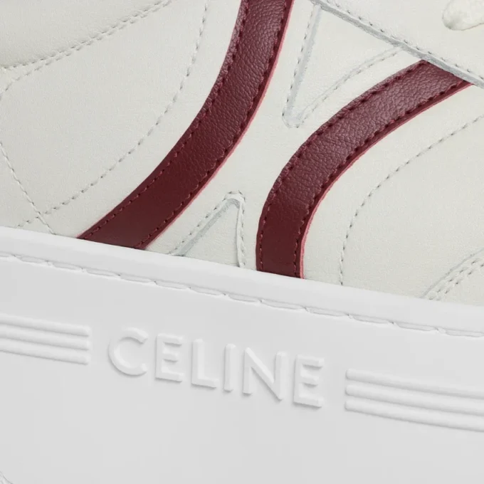CELINE – Block-sneakers med Triomphe-mönster baktill och kilklack i kalvskinn CELINE – Block-sneakers med Triomphe-mönster baktill och kilklack i kalvskinn
