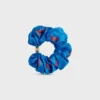 CELINE C Sulky Scrunchy i siden och mässing med guldfinish CELINE C Sulky Scrunchy i siden och mässing med guldfinish