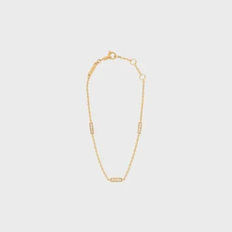 CELINE Line trippelarmband i gult guld och diamanter