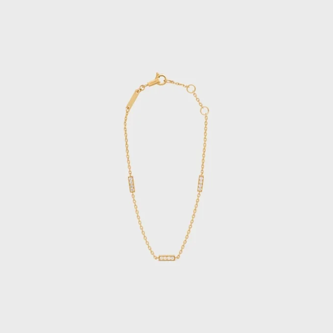 CELINE Line trippelarmband i gult guld och diamanter CELINE Line trippelarmband i gult guld och diamanter