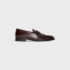 CELINE Malaquais Penny Triomphe Loafer i polerat tjurläder CELINE Malaquais Penny Triomphe Loafer i polerat tjurläder