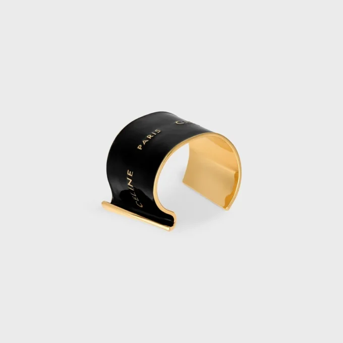 CELINE Ribbon stort armband i emalj och mässing med guldfinish CELINE Ribbon stort armband i emalj och mässing med guldfinish