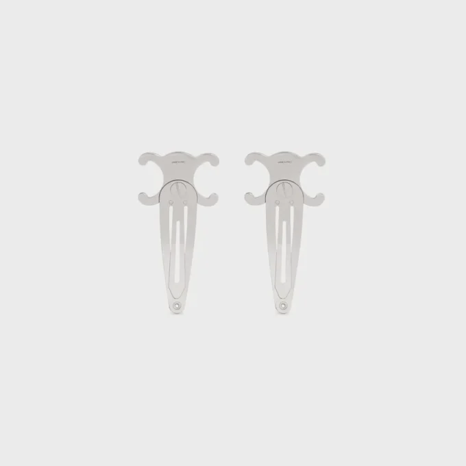 CELINE Set med 2 hårspännen i mässing med rodiumfinish och stål CELINE Set med 2 hårspännen i mässing med rodiumfinish och stål