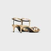 CELINE Triomphe-sandal i laminerat lammskinn CELINE Triomphe-sandal i laminerat lammskinn