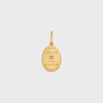 Charms CELINE-medalj i mässing med guldfinish