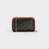 Clutch med kedja i Triomphe Canvas och lammskinn Clutch med kedja i Triomphe Canvas och lammskinn