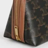 Clutch med kedja i Triomphe Canvas och lammskinn Clutch med kedja i Triomphe Canvas och lammskinn