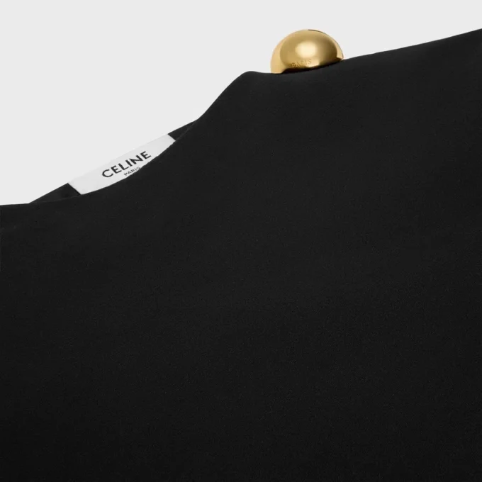 Draperad topp i ull och silke