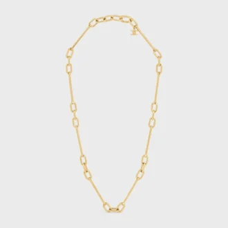 Halsband med berlocker i mässing med guldfinish