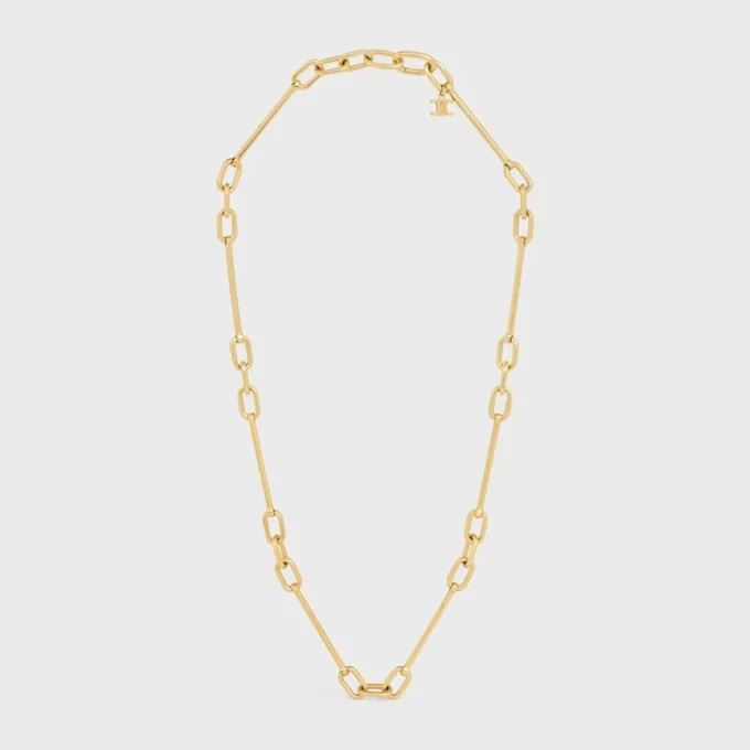 Halsband med berlocker i mässing med guldfinish Halsband med berlocker i mässing med guldfinish