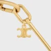 Halsband med berlocker i mässing med guldfinish Halsband med berlocker i mässing med guldfinish