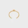 Knot Double Cuff i mässing med guldfinish