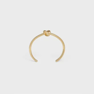 Knot extra tunt armband i mässing med guldfinish