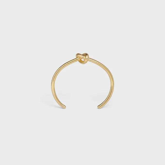 Knot extra tunt armband i mässing med guldfinish