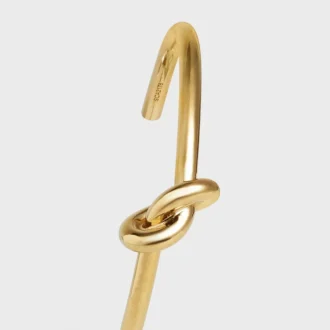 Knot extra tunt armband i mässing med guldfinish