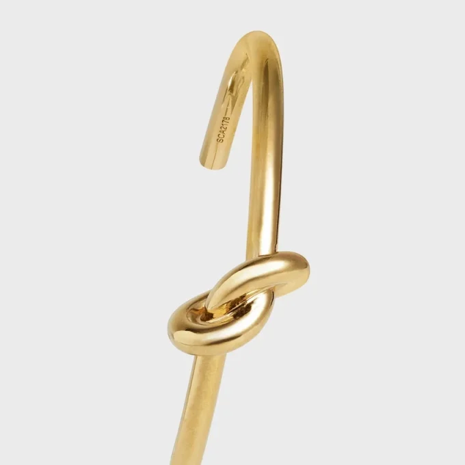 Knot extra tunt armband i mässing med guldfinish