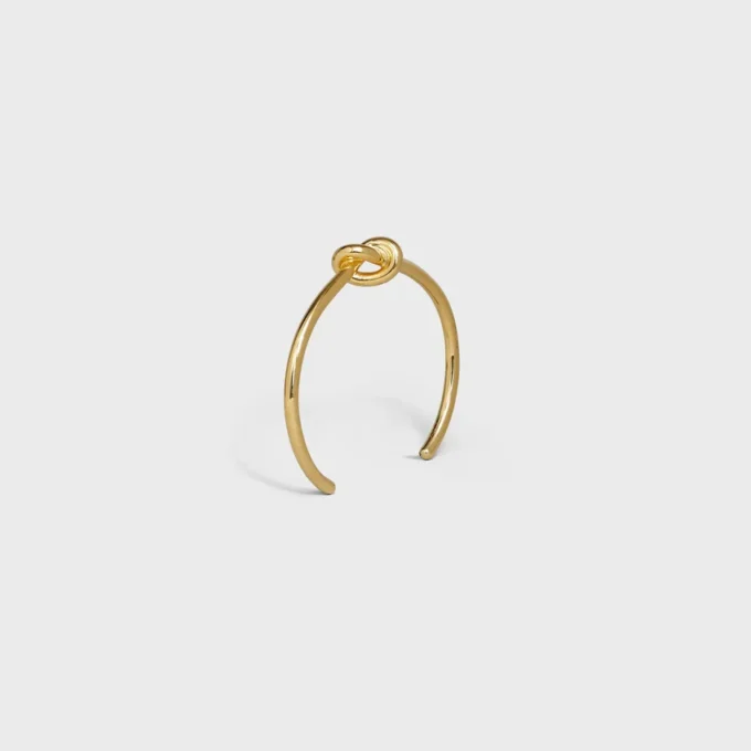 Knot extra tunt armband i mässing med guldfinish