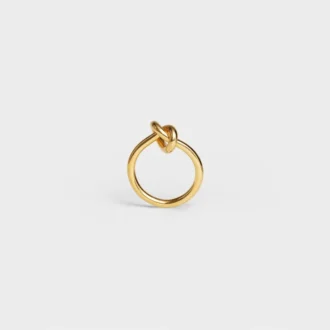 Knotring i mässing med guldfinish