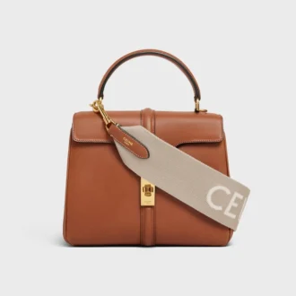Kort rem i ull med CELINE-jacquard och gulddetaljer