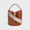 Kort rem i ull med CELINE-jacquard och gulddetaljer