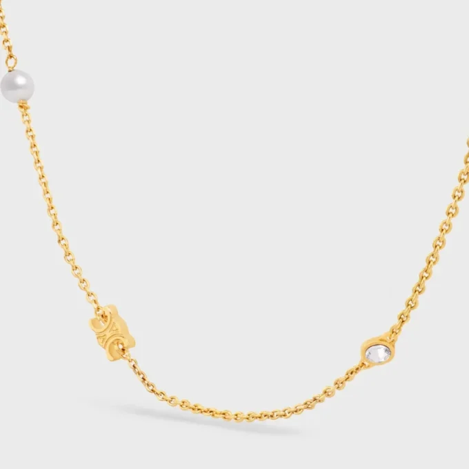 Les Perles CELINE-halsband i strass, hartsperlor och mässing med guldfinish Les Perles CELINE-halsband i strass, hartsperlor och mässing med guldfinish