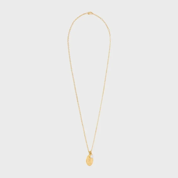 Les Perles CELINE medaljonghalsband i harts och mässing med guldfinish Les Perles CELINE medaljonghalsband i harts och mässing med guldfinish