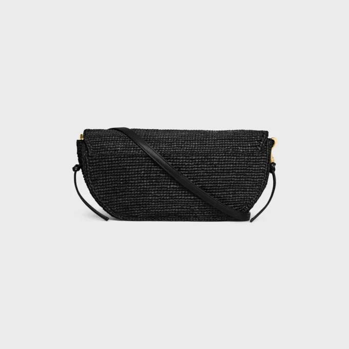 Liten halvmåneformad Soft Triomphe i raffia och lammskinn