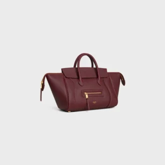 Liten luggage i kornigt kalvskinn
