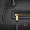 Liten luggage i kornigt kalvskinn