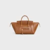 Liten luggage i mjukt, glansigt lammskinn