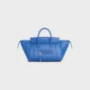 Liten luggage i mjukt, glansigt lammskinn