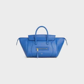 Liten luggage i mjukt, glansigt lammskinn