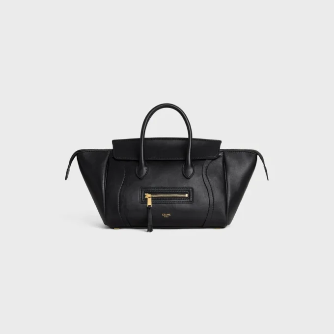 Liten luggage i mjukt, glansigt lammskinn Liten luggage i mjukt, glansigt lammskinn