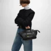 Liten luggage i mjukt, glansigt lammskinn Liten luggage i mjukt, glansigt lammskinn