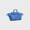 Liten luggage i mjukt, glansigt lammskinn