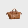 Liten luggage i mjukt, glansigt lammskinn