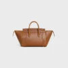 Liten luggage i mjukt, glansigt lammskinn
