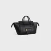 Liten luggage i mjukt, glansigt lammskinn Liten luggage i mjukt, glansigt lammskinn
