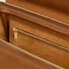 Liten luggage i mjukt, glansigt lammskinn