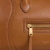 Liten luggage i mjukt, glansigt lammskinn