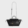 Liten luggage i mjukt, glansigt lammskinn Liten luggage i mjukt, glansigt lammskinn